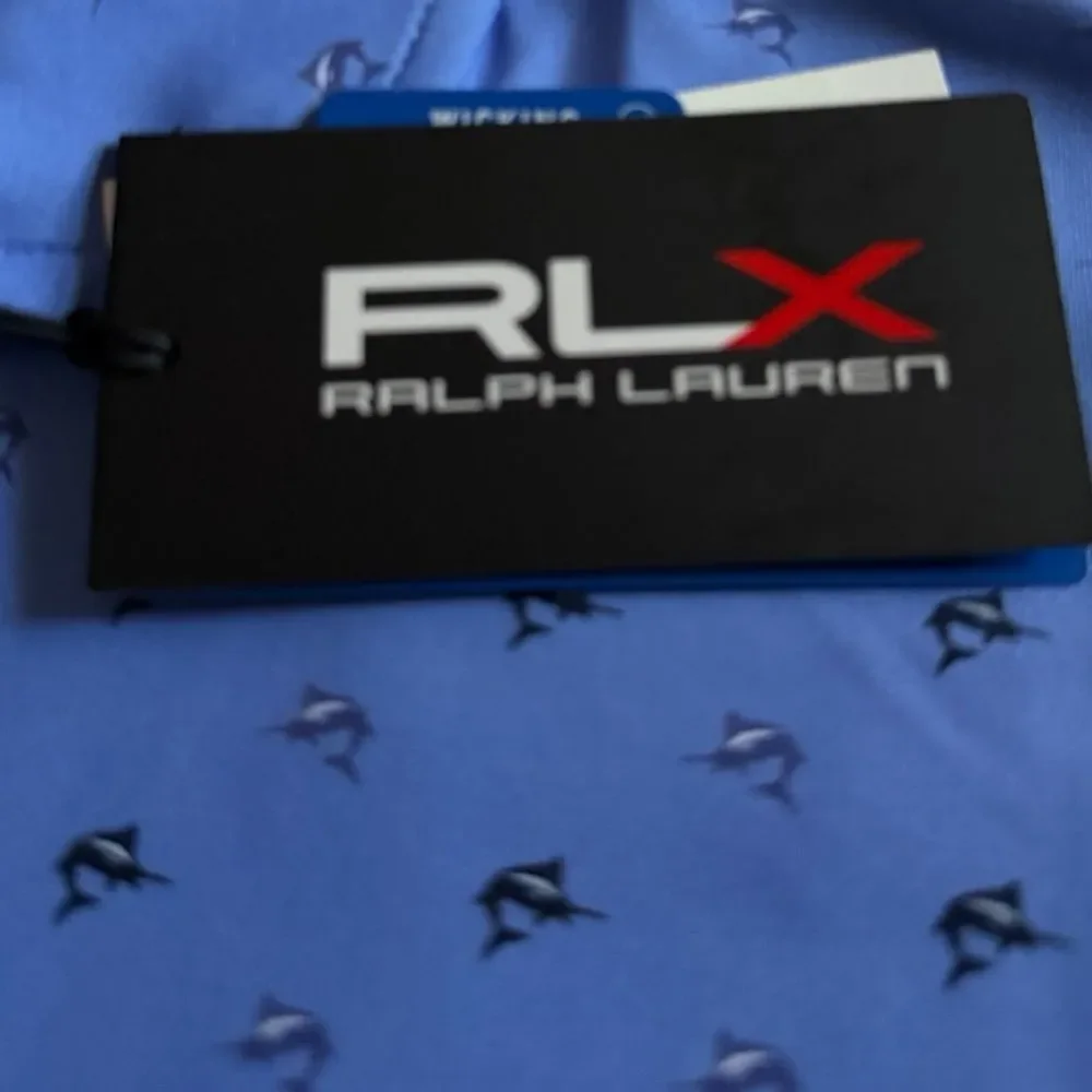 NWT RLX Ralph Lauren Men’s Polo Shirt with Dolphin Pattern S